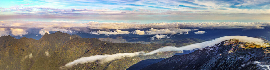 view from Mount Washington in New Hampshire to white mountains with spectacular cloudscape