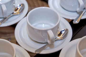 With white bowl and saucer spoon. cup