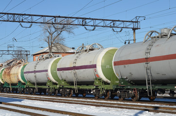 Fototapeta na wymiar railroad tank cars in winter