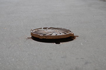 open hatch and passerby