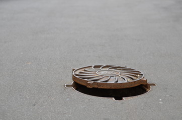open hatch and passerby