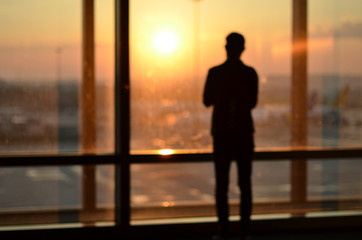 Fototapeta premium man is waiting in airport blur background