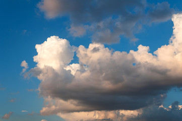 blue sky with white and gray clouds
