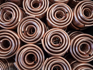 Heat exchangers obtained by wrapping copper tube.