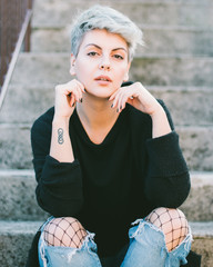 portrait of a women in autumn street  outfit