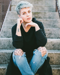 portrait of a women in autumn street  outfit
