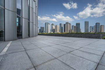 Fototapeta premium Panoramic skyline and buildings with empty square floor.