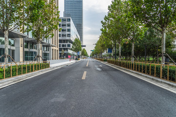 city road through modern buildings in tianjin