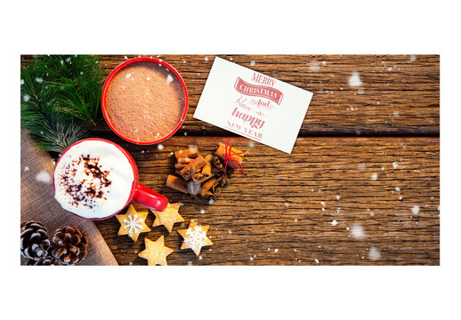 Holiday Card Mockup with Festive Elements on Wooden Table
