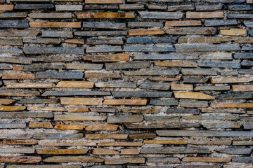 texture of multicolored stone wall tiles