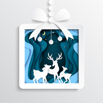 Paper gift box with deers family joyful on blue snow and winter season background.For merry christmas and happy new year paper art style.Vector illustration.