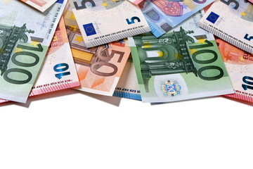 Top border of various different Euro currency money bill note or banknote isolated on white background photo