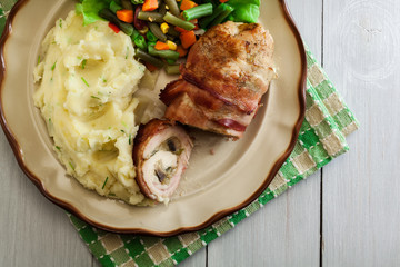 Chicken breast stuffed with champignon