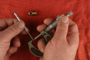 Metric Micrometer,  small hole gauge, red shop towel background, brass part