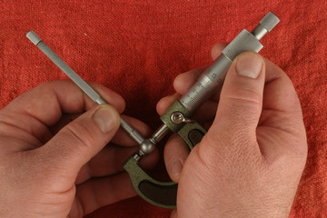 Metric Micrometer, telescoping gauge, red shop towel background