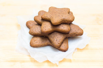 Gingerbread cookies / Christmas biscuits in the shape of stars 