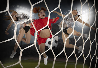 Young woman playing soccer