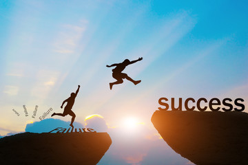 Men jump over silhouette failure Committed to success.