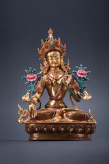 Bronze figurine of a green Tara - the great woman of a bodkhisattva. - obrazy, fototapety, plakaty