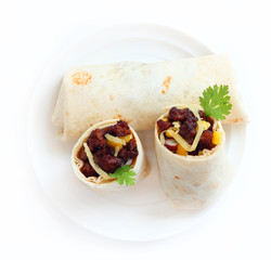 Burritos wraps with minced meat and vegetables.
