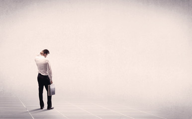 Fototapeta premium Business person standing in empty space