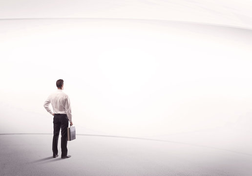 Businessman With Briefcase Standing Still