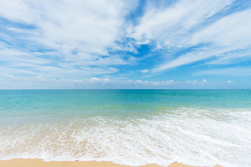 Fototapeta na wymiar Beautiful beach with blue sky at Mai khao beach, Phuket, Thailand
