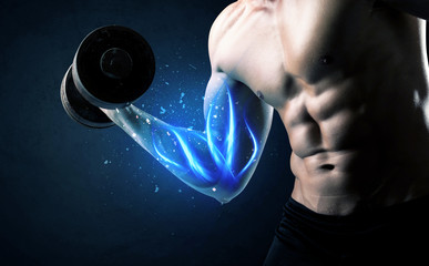 Fit athlete lifting weight with blue muscle light concept