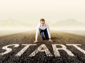 Businessman at start line