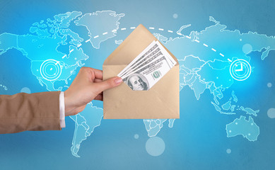 Hand holding envelope with global concept