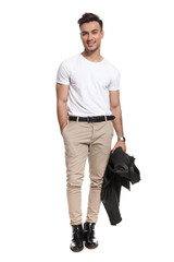 Naklejka premium full body picture of a smiling young man