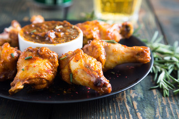 Fried chicken wings with spicy sauce