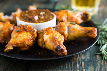 Fried chicken wings with spicy sauce