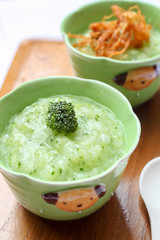 Baby food , Bowl with healthy baby food on table.