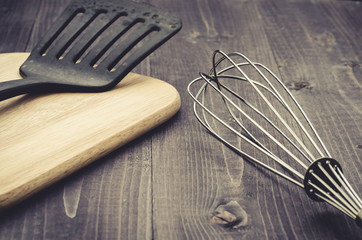 kitchen accessories on a wooden background/kitchen accessories on a wooden background. Selective...