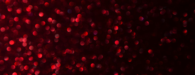 Red glitter texture christmas abstract background or bokeh - panoramic