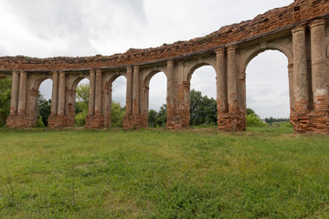 Fototapeta na wymiar Arcs of Ruined Ruzhanskiy Palace in Belarus in summer
