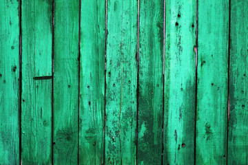 Dark green old wooden boards. Backgrounds and textures fence painted. Front view. Attract beautiful vintage background.