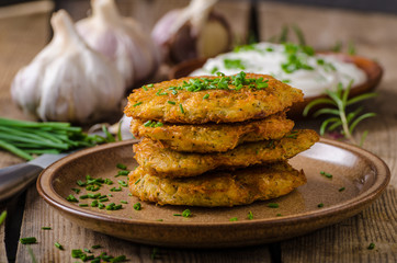 Potato pancakes with sour cream