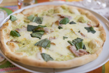 italian pizza on a white plate