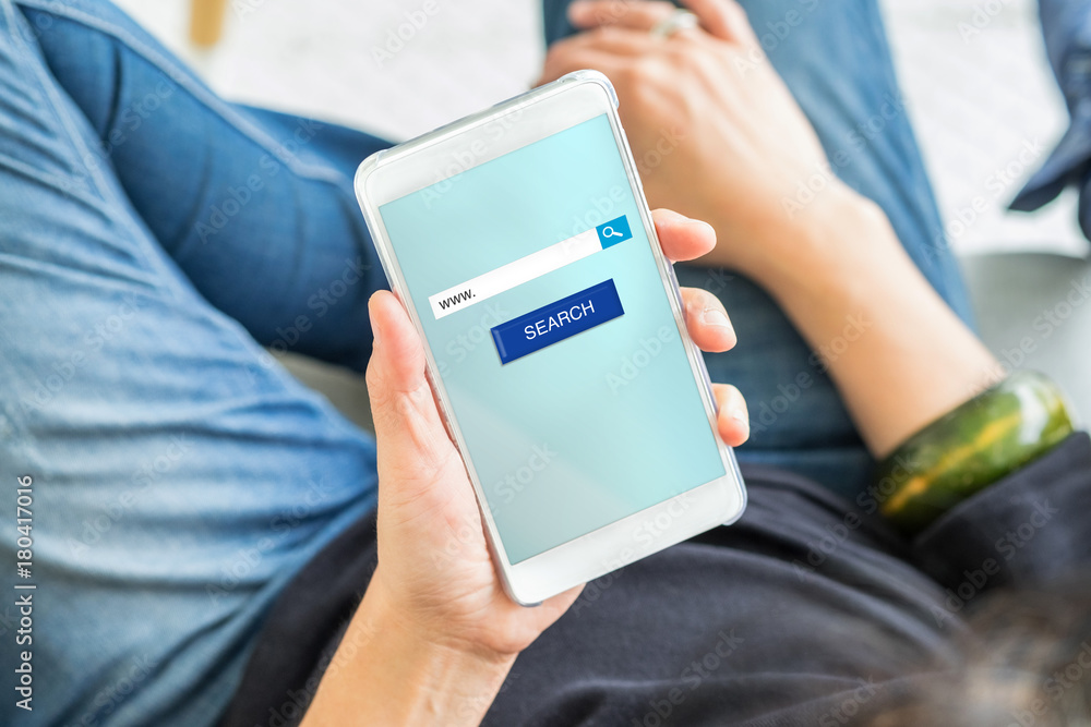 Aufkleber search button and address bar on mobile screen with woman holding mobile phone searching for data on