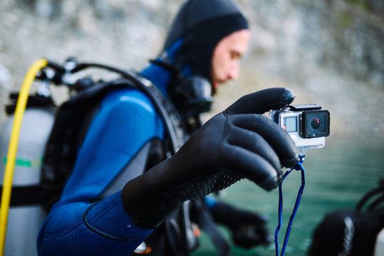Diver with underwater camera