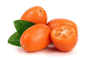 Cumquat or kumquat with leaf isolated on white background close up