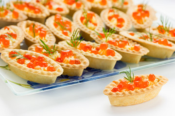 Tartlets with red caviar