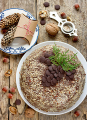 Christmas cake with chocolate cream and nut crumb