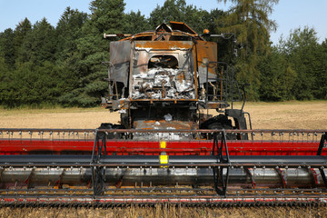 Combine harvester destroyed by fire