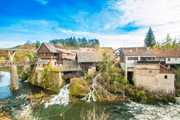 Naklejka premium Village of Rastoke near Slunj in Croatia, old water mills on waterfalls of Korana river, beautiful countryside landscape 