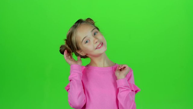 Child shows different emotions. Green screen