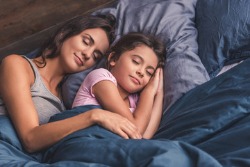 Mom and daughter at home