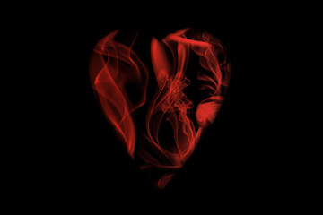 Fototapeta na wymiar Corazón de humo rojo.